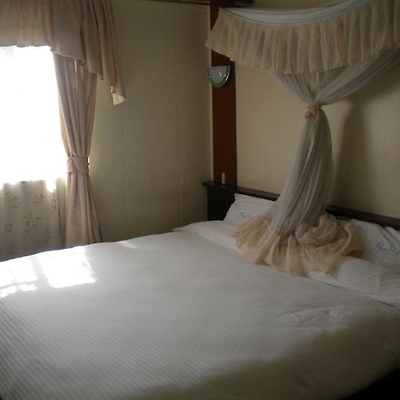 Blue Hut Hotel Nairobi Quarto foto